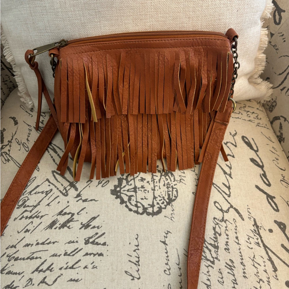 Brown pleather fringe purse, cross body straps, brass detailing, black lining